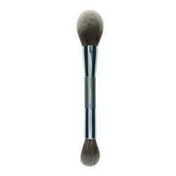 Compact travel powder brush applying makeup